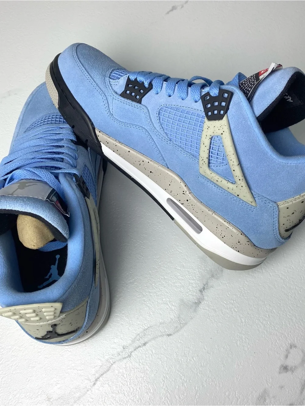 Jordan Men’s Sneakers in University Blue and Light Cream Accents